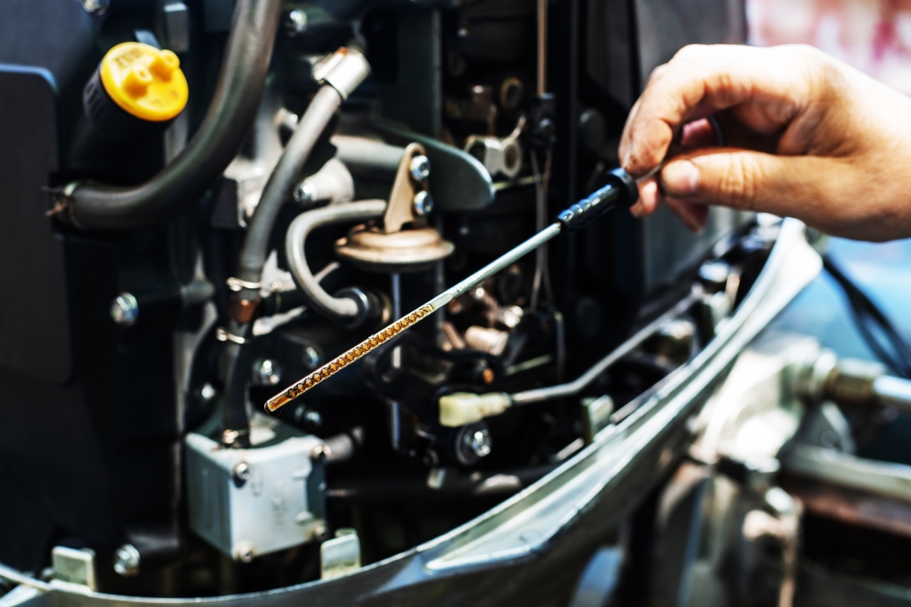 Checking,The,Oil,Level,In,The,Boat,Engine.,A,Dipstick