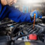 Close,Up,Hand,Hispanic,Latin,Male,Mechanic,Repairs,Car,In