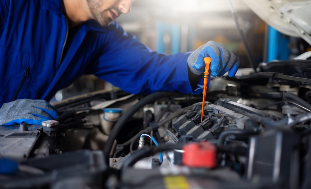 Close,Up,Hand,Hispanic,Latin,Male,Mechanic,Repairs,Car,In