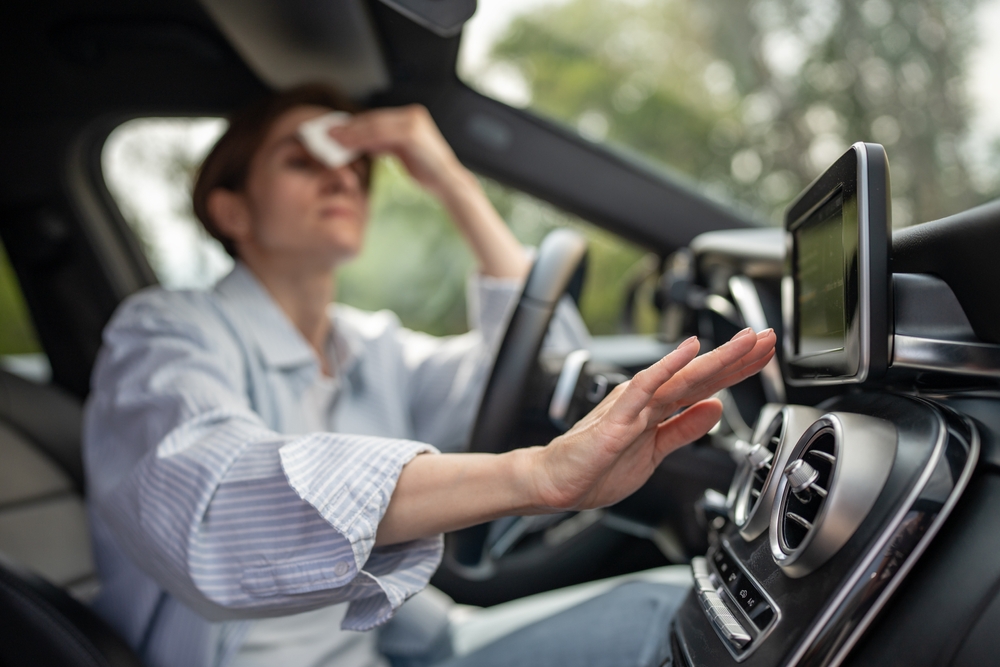 Woman,Drives,Car,With,Broken,Air,Conditioning,In,Hot,Summer